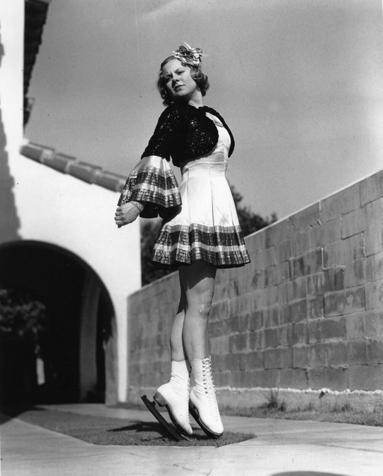 1936: Figure skater Sonja Henie wins 10th straight world championship